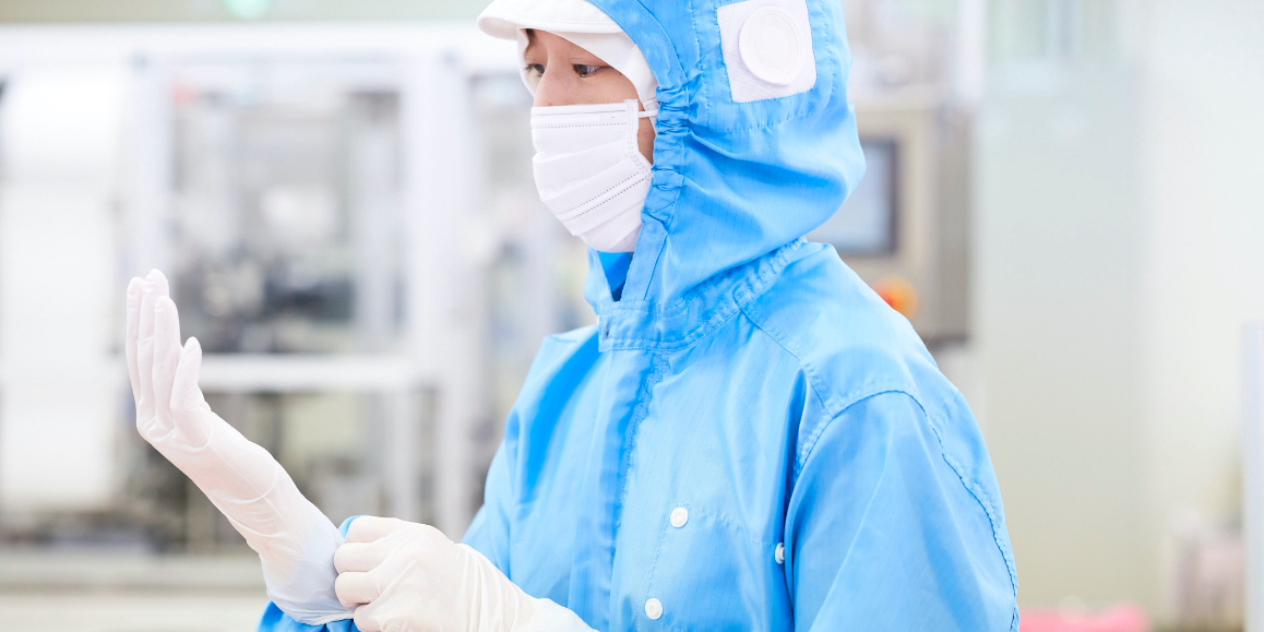 After a secondary change of clothing, employees wash and disinfect hands and wear rubber gloves.