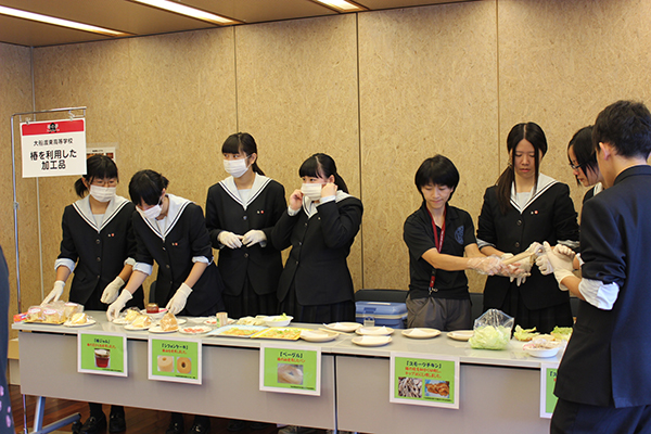 Ofunato Higashi High School with their food and sweets that contain camellia oil
