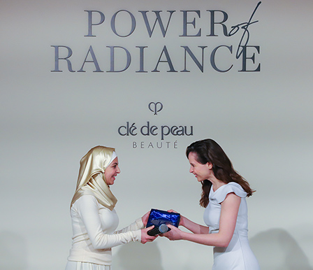 Muzoon Almellehan, first annual award recipient of the Power of Radiance Program (on the left)